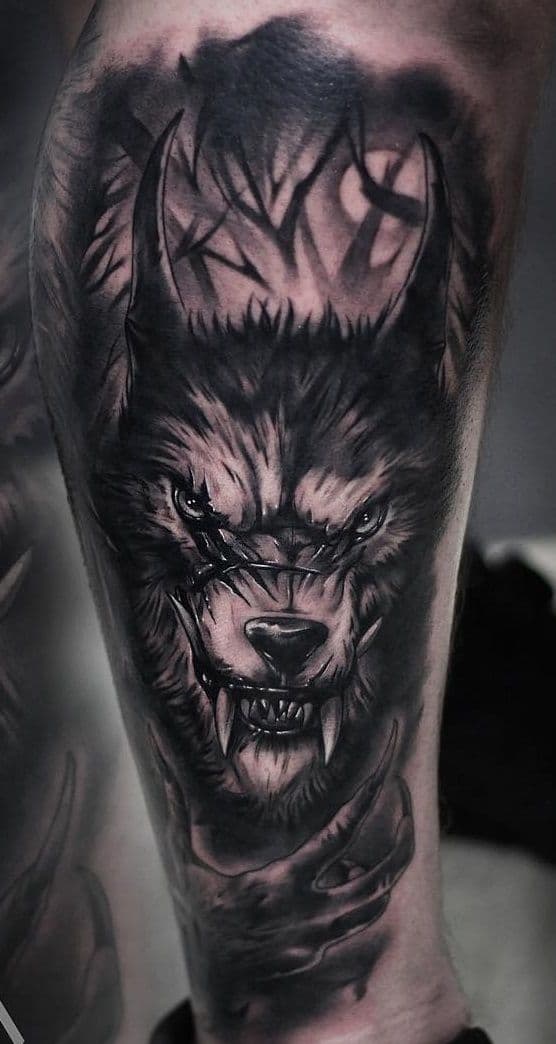 Werewolf tatoo with a scars on the face.